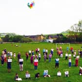 Waterside residents send a clear message to the council on the very green space they face losing. Pic: Edward Z Smith