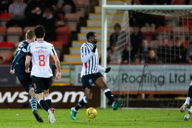 Iain Wilson's shot puts Morton ahead against Dunfermline just before half time.