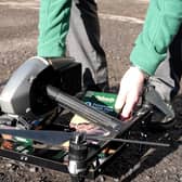 Loading up the Holland's pies on the drone for delivery (photo: Ben Frith)