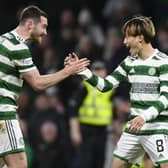Celtic's Anthony Ralston (left) and Kyogo Furuhashi celebrate after the 4-2 win over Dundee United. (Photo by Rob Casey / SNS Group)