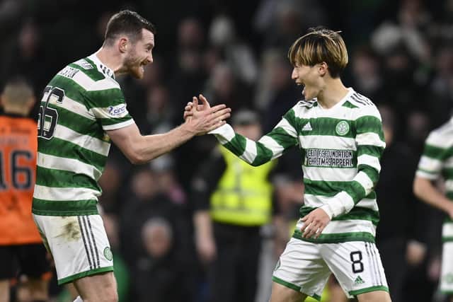 Celtic's Anthony Ralston (left) and Kyogo Furuhashi celebrate after the 4-2 win over Dundee United. (Photo by Rob Casey / SNS Group)