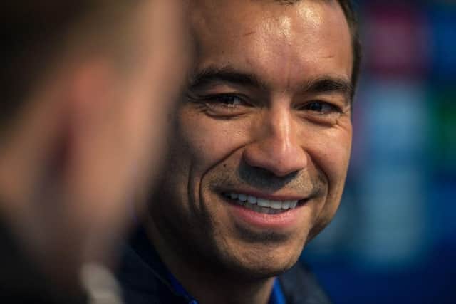 Former Feyenoord boss Gio van Bronckhorst is said to be interested  (Photo credit should read OLI SCARFF/AFP via Getty Images)