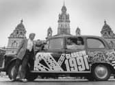 A taxi in George Square during the City of Culture year in 1990. Picture: TSPL