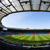 Hampden Park Stadium. There is several bars around the stadium.  