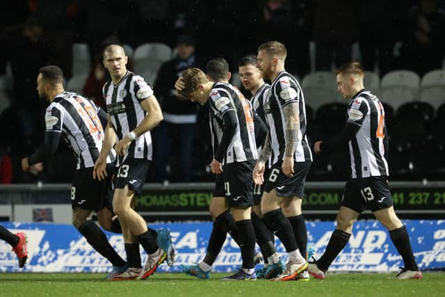 St Mirren's Alex Grieve celebrates making it 2-1 with teammates during a cinch Premiership match between St. Mirren and St Johnstone at the SMISA Stadium, on February 09, 2022, in Paisley, Scotland.