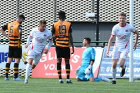 David Goodwillie runs off in celebration after grabbing the winner for Clyde against Alloa (pic: David Glencross)