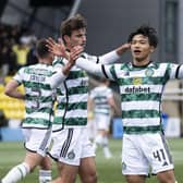 Reo Hatate celebrates after putting Celtic ahead from the penalty spot. (Photo by Paul Devlin / SNS Group)