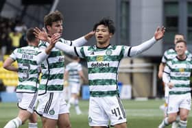 Reo Hatate celebrates after putting Celtic ahead from the penalty spot. (Photo by Paul Devlin / SNS Group)