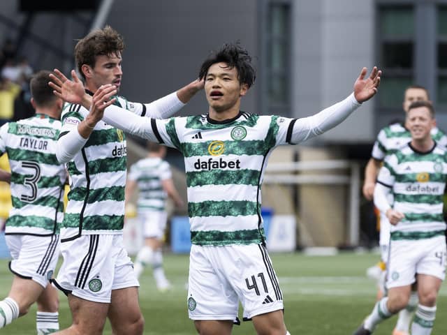 Reo Hatate celebrates after putting Celtic ahead from the penalty spot. (Photo by Paul Devlin / SNS Group)