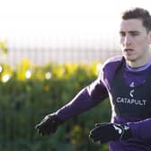 Paul Hanlon is back in the Hibs building after illness.