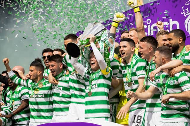 Celtic captain Callum McGregor lifts the the 2021-22 Scottish Premiership trophy. (Photo by Craig Williamson / SNS Group)