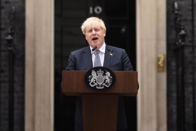 Boris Johnson addresses the nation as he announces his resignation outside 10 Downing Street. (Photo by Dan Kitwood/Getty Images)