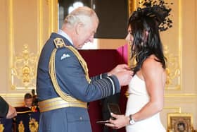 Eve Muirhead chats to the Prince of Wales as she is made an MBE  and an OBE
Pic: Jonathan Brady