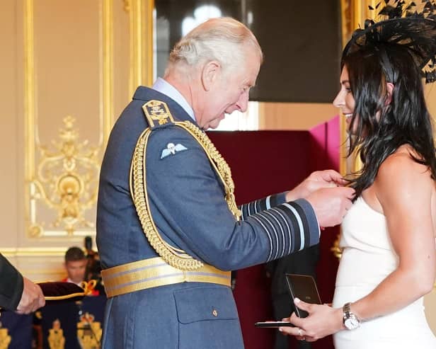 Eve Muirhead chats to the Prince of Wales as she is made an MBE  and an OBE
Pic: Jonathan Brady
