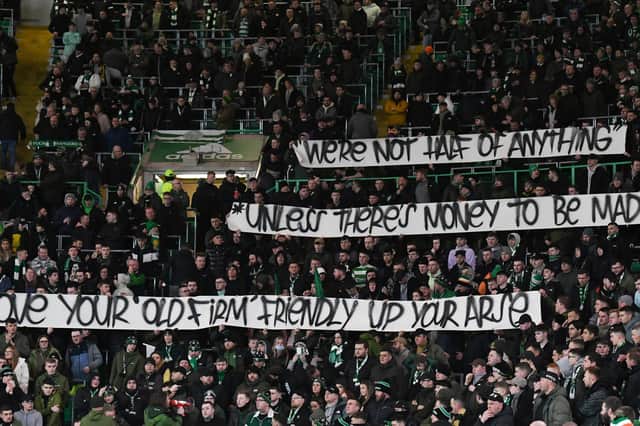 Celtic fans banner against a proposed Australian Old Firm friendly during a Cinch Premiership match against St Mirren at Celtic Park. (Photo by Ross MacDonald / SNS Group)