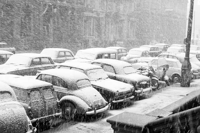 Snow covered cars in St Vincent Street.