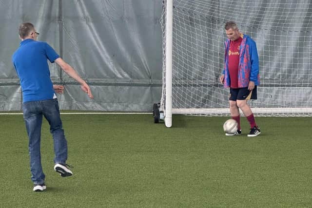 Care home residents taking part in walking football