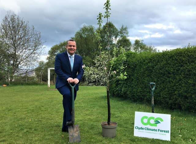 Councillor Andrew Polson, joint leader of East Dunbartonshire Council, is ready to start planting