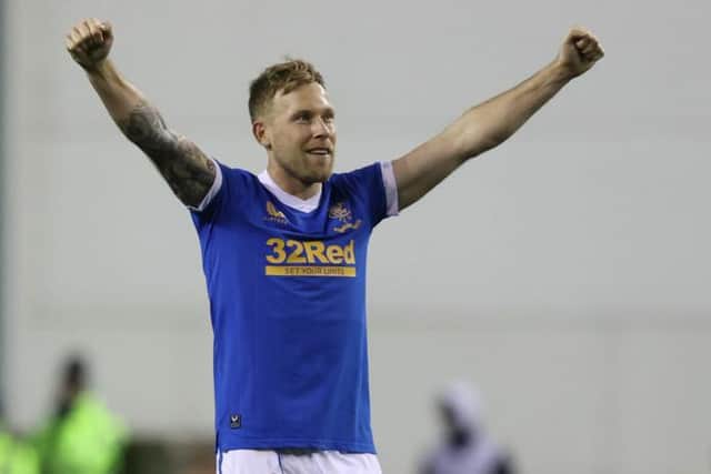 Rangers midfielder Scott Arfield is relishing the prospect of landing a glamour tie in Monday's Europa League knockout round play-off draw.  (Photo by Craig Williamson / SNS Group)