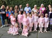 Young stars who took part in the 50th anniversary show recently met the benefactors to present the proceeds.