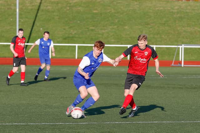 Rovers' Mark O'Reilly (left) tries to make inroads against Thorniewood (Pic by Kevin Ramage)