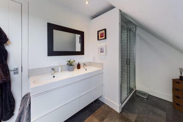 The en-suite shower room is carefully thought out to make the best use of the space.