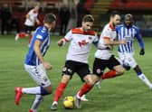 David Goodwillie tries to find a way through the Kilmarnock defence (pic: Craig Black Photography)