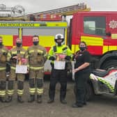 Community police officers and SFRS crew have joined forces to help residents retain their wheelie bins.