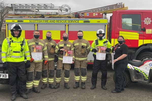 Community police officers and SFRS crew have joined forces to help residents retain their wheelie bins.