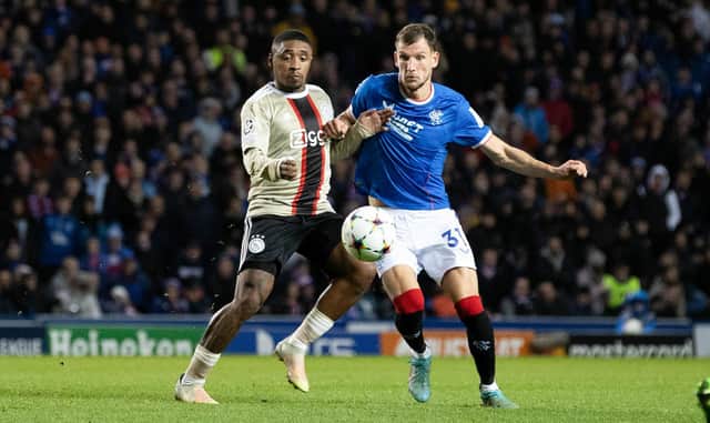 Rangers defender Borna Barisic is challenged by Ajax's Steven Bergwijn during the Champions League match at Ibrox. (Photo by Alan Harvey / SNS Group)