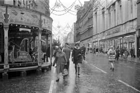 People doing Christmas shopping in a traffic-free Sauchiehall Street in December 1972.