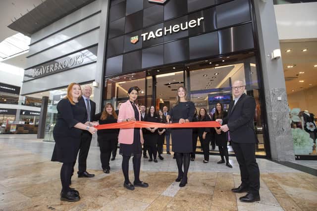 Cutting the ribbon to reopen the Beaverbrooks store and launch the TAG Heuer boutique at Silverburn