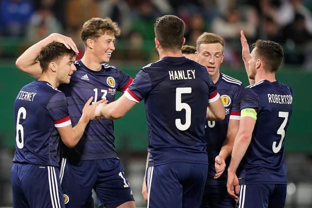 Jack Hendry (second left) celebrates with his team-mates after opening the scoring for Scotland in the 2-2 draw against Austria. (Photo by Christian Hofer/Getty Images)