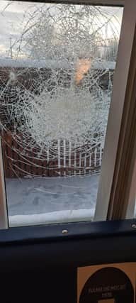 A window at Kessington Medical Centre shattered overnight by vandals.