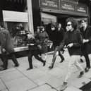 Photographer Barry Feinstein captured Bob Dylan walking along Princes Street in May 1966.