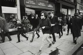 Photographer Barry Feinstein captured Bob Dylan walking along Princes Street in May 1966.