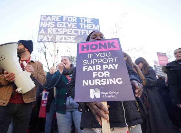 <p>Members of the Royal College of Nursing (RCN) on the picket line outside St Thomas' Hospital, central London. Continued strike action plus winter pressures are jeopardising the ability of the NHS to break out of a "vicious cycle", a health leader has said. Issue date: Wednesday January 18, 2023.</p>
