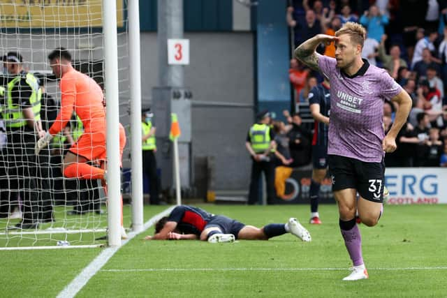 Scott Arfield celebrates after scoring to make it 4-2 Rangers during a cinch Premiership match between Ross County and Rangers at The Global Energy Arena on August 22, 2021, in Dingwall.