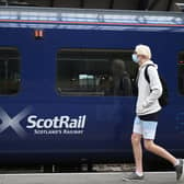 A community councillor has called for a rail service to Castlemilk. 