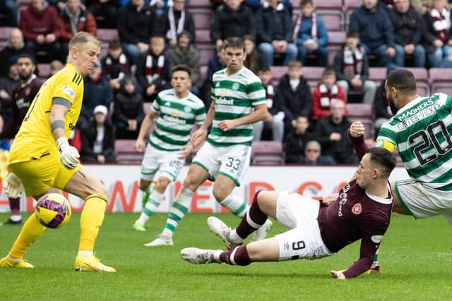 Hearts' Lawrence Shankland scores to make it 2-1 against Celtic.