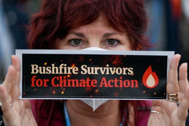 Protesters move through restricted Blue Zone area of COP26 climate summit