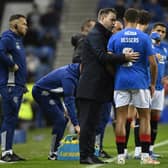 Rangers manager Michael Beale speaks to Cyriel Dessers during a Viaplay Cup Quarter-final match between Rangers and Livingston at Ibrox