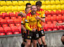 Zak Rudden celebrates scoring the opening goal in Partick Thistle's title-clinching rout of Falkirk at Firhill. (Photo by Craig Foy / SNS Group)