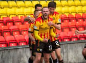 Zak Rudden celebrates scoring the opening goal in Partick Thistle's title-clinching rout of Falkirk at Firhill. (Photo by Craig Foy / SNS Group)