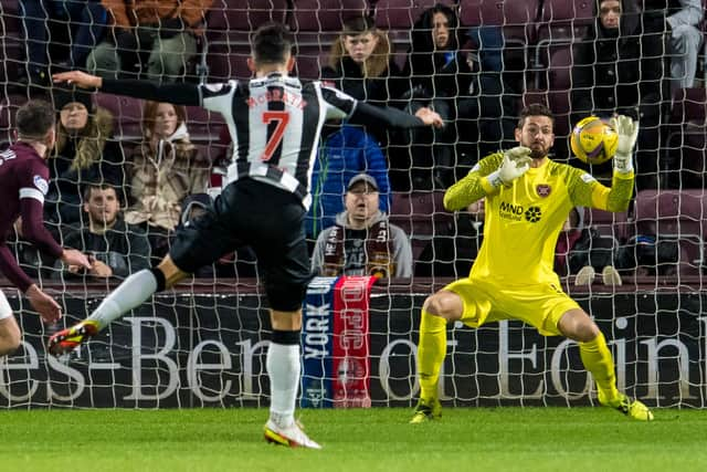 Hearts' Craig Gordon makes a save from St Mirren's Jamie McGrath.