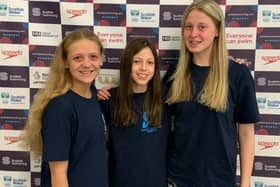 Lanark swimmers, from left, Caitlyn Hamilton, Evi Mackie and Katie Towers