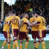 Motherwell players celebrate Efford's equaliser