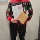 Gavin Kerr is among the optometry staff celebrating a career milestone at Specsavers Glasgow Forge