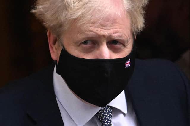 Prime Minister Boris Johnson leaves 10 Downing Street For PMQs. (Photo by Leon Neal/Getty Images)