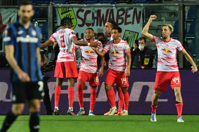 RB Leipzig's French midfielder Christopher Nkunku (3rd L Rear) celebrates after scoring a penalty during the UEFA Europa League quarter-final, second-leg football match between Atalanta and RB Leipzig at the Azzurri d'Italia stadium in Bergamo. (Photo by MIGUEL MEDINA/AFP via Getty Images)